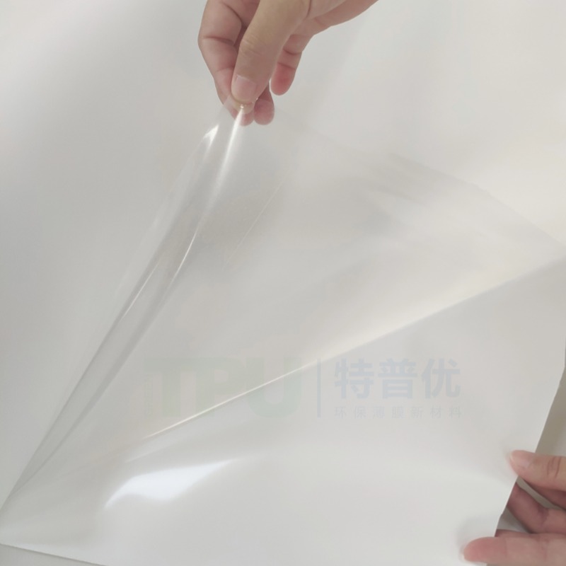 Solvent-free TPU hot melt adhesive film for premium functional apparel offering eco-friendly safe and durable bonding for jackets skiwear and outdoor gear